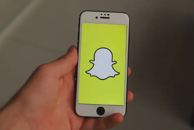 Step-by-step guide showing how to turn camera on for snapchat for iOS and Android devices